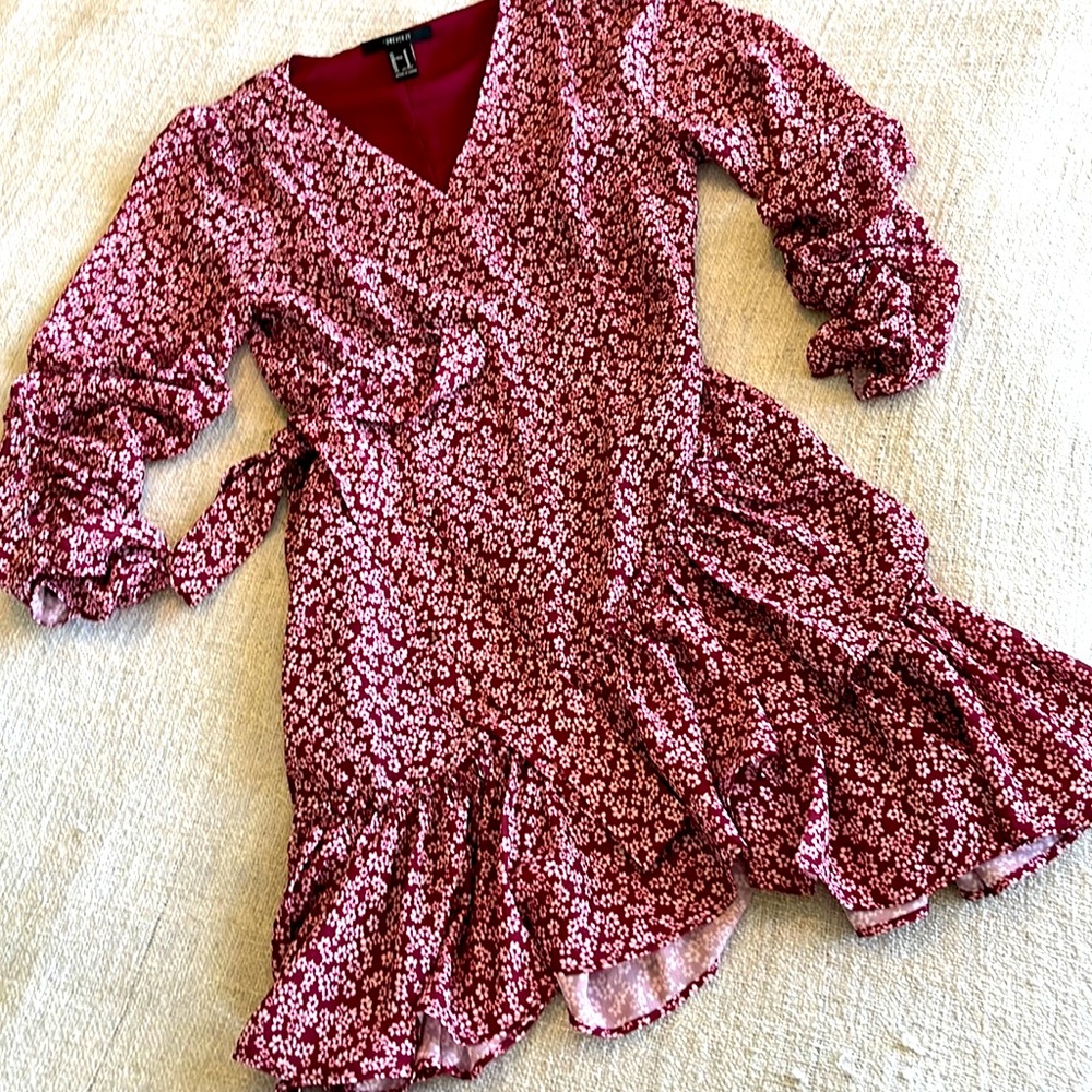 Forever 21 Burgundy w/white floral, long sleeve mini wrap dress.